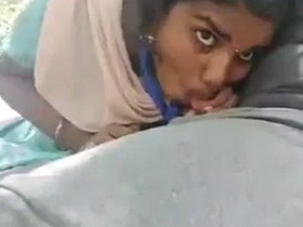 A woman gives a blowjob to her male coworker