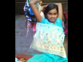 Teenage girl records her nude body in a video