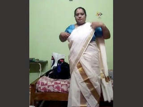 Aunty Tia flaunts her curves in seductive outfits