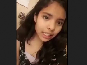 Petite teen with fringe in MMS video