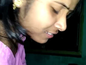 Indian babe with a cute face gives a blowjob to her boyfriend's cock