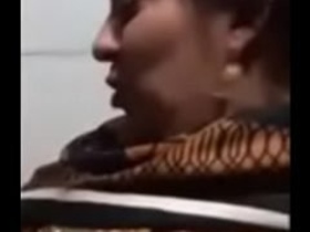 Big-breasted housewife gives a blowjob to her husband's big cock