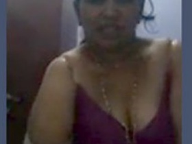 Desi aunty's fashionable selfie with a camera