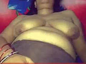 Mature aunty Sougandha enjoys solo play and sucking a big cock
