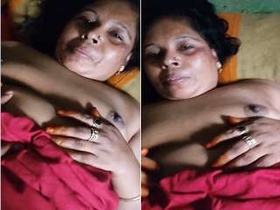 Desi Boudi's big boobs and fucking in an exclusive video
