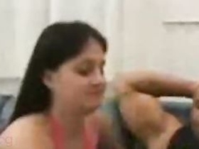 Watch a hot Tamil girl give a blowjob and get fucked in a threesome