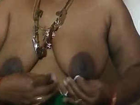 Tamil wife wears saree in mature porn video