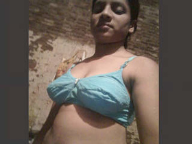 A Tamil girl records a video for her boyfriend with her phone