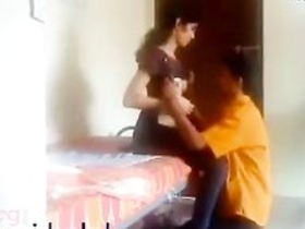 Watch a college couple get naughty in HD in their dorm room