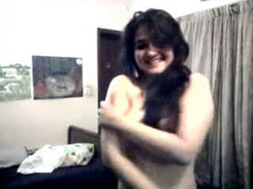 College hottie strips down to nothing in front of the camera