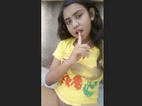 Excited girl reaches climax through fingering