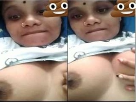 Tamil babe flaunts her big boobs on camera