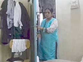 Desi aunt strips naked in village setting