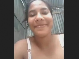 Horny girl enjoys fingering and jerking her wet pussy in the village