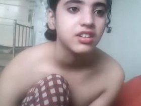 Innocent teen babe in nude shows her sexy body and nice boobs