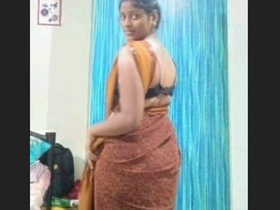 Tamil-speaking wife with a sexy voice teases in this hot video