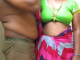 Desi aunty's big boobs get squeezed by hubby in Tamil video