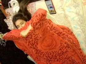 Indian girl gets caught on camera in a hotel room, speaking in Hindi