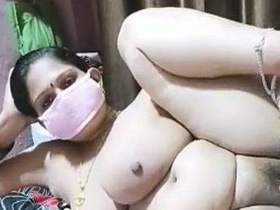Big boobs and a mask: Husboo's solo masturbation video