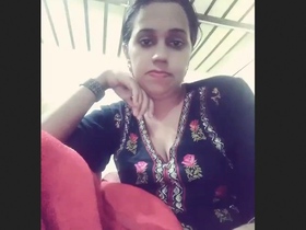 Bhabhi seductively strips and records a video for her lover