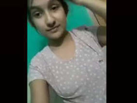 Cute desi girl shows off and fingering in new video