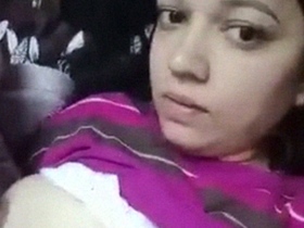 Big-boobed Indian girl goes nude in solo video