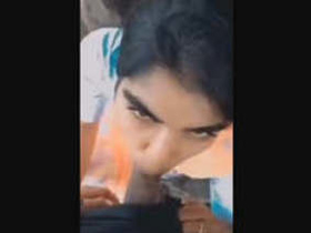 Cute Indian girl gives a blowjob in the outdoors