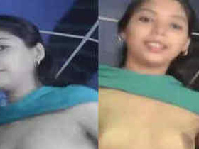 Indian college girl pleasures herself with small tits, arousing XXX desire