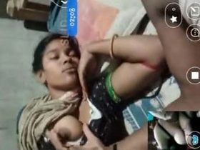 Husband flaunts his wife's breasts during video call with friends