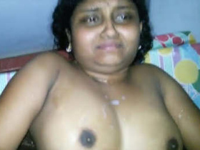 Wife tries to avoid getting cum on her face while having sex
