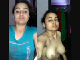Girl with big boobs masturbates with her fingers
