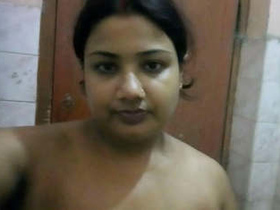 Cute aunty takes sexy selfies in the bathroom