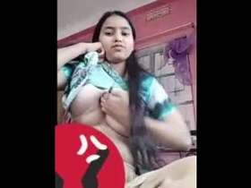 Desi cutie exposes her small tits on camera