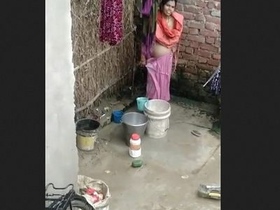 Indian bhabhi soaps up in the great outdoors