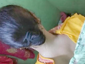 Watch the village bhabi get naughty in a steamy bathroom video