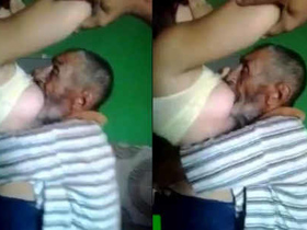 Arab curvy woman feeds milk to old man's penis