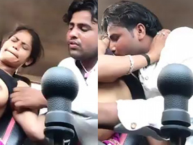 Desi couple enjoys sex in car with boob sucking