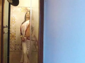 Devika's seductive striptease will leave you breathless