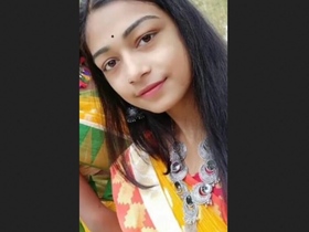 Assamese girl's pussy gets fingered in a steamy video