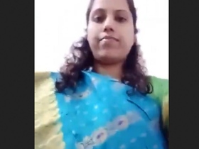 Indian wife undresses and flaunts her curvaceous figure in a sari
