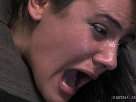 A hot brunette indulges in painful BDSM with her experienced partner