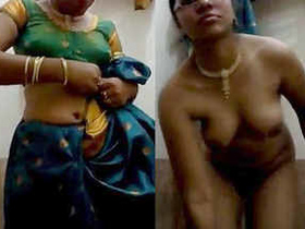 Desi x girl strips and shows off her boobs and pussy