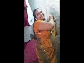Anjali Mallu's aunty flaunts her curves in a saree and strips for her lover