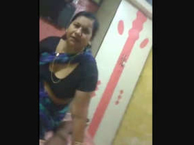 MILF aunty gives oral pleasure to her son's friend