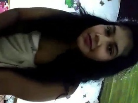 Cute girl masturbates in front of the camera