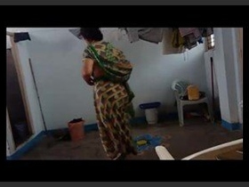 Bhabhi caught on camera while undressing in the shower