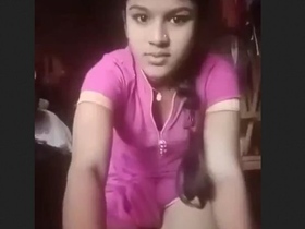 Cute girl from the village pleasures herself with her fingers