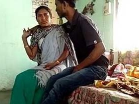 Desi aunty gets fucked by her son's friend in a steamy video
