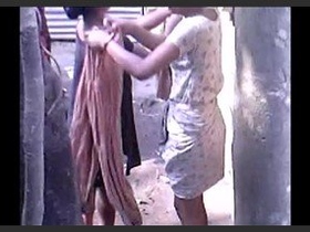 Outdoor shower fun with a busty girl