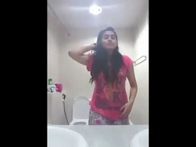 College girl indulges in solo play with her phone camera